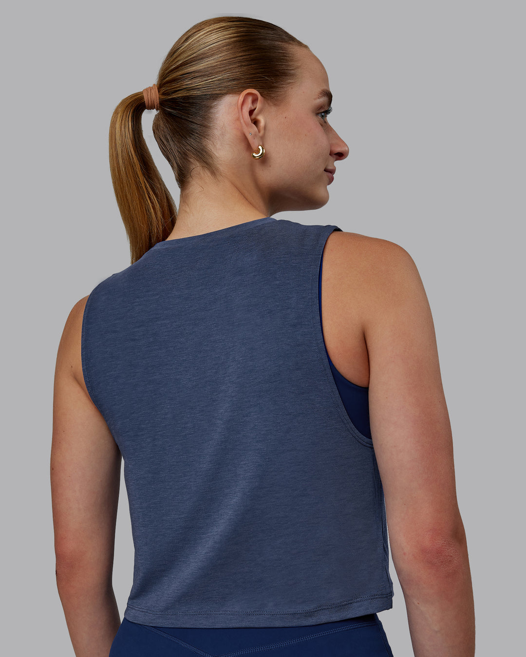 Woman wearing Vital Cropped Training Tank - Midnight Blue - view 3