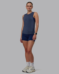 Woman wearing Vital Training Tank - Midnight Blue | Thumbnail Index: 1