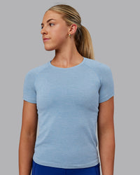 Woman wearing AeroFLX+ Seamless Tee - Elemental Blue/Ice Blue | Thumbnail Index: 4
