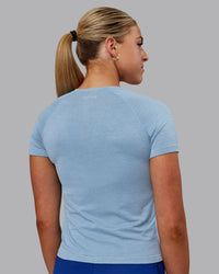 Woman wearing AeroFLX+ Seamless Tee - Elemental Blue/Ice Blue | Thumbnail Index: 2