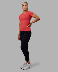 Woman wearing AeroFLX+ Seamless Tee - Fuchsia Pink/Grenadine | Thumbnail Index: 3