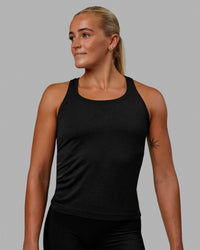 Woman wearing AeroFLX+ Seamless Tank - Black Marl | Thumbnail Index: 8