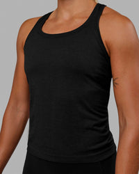 Woman wearing AeroFLX+ Seamless Tank - Black Marl | Thumbnail Index: 5