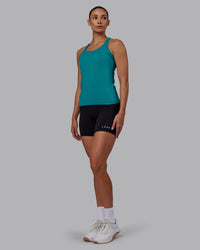 Woman wearing AeroFLX+ Seamless Tank - Blue Bird Marl | Thumbnail Index: 3