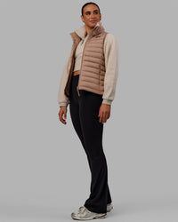 Woman wearing All Day Puffer Vest - Desert | Thumbnail Index: 5