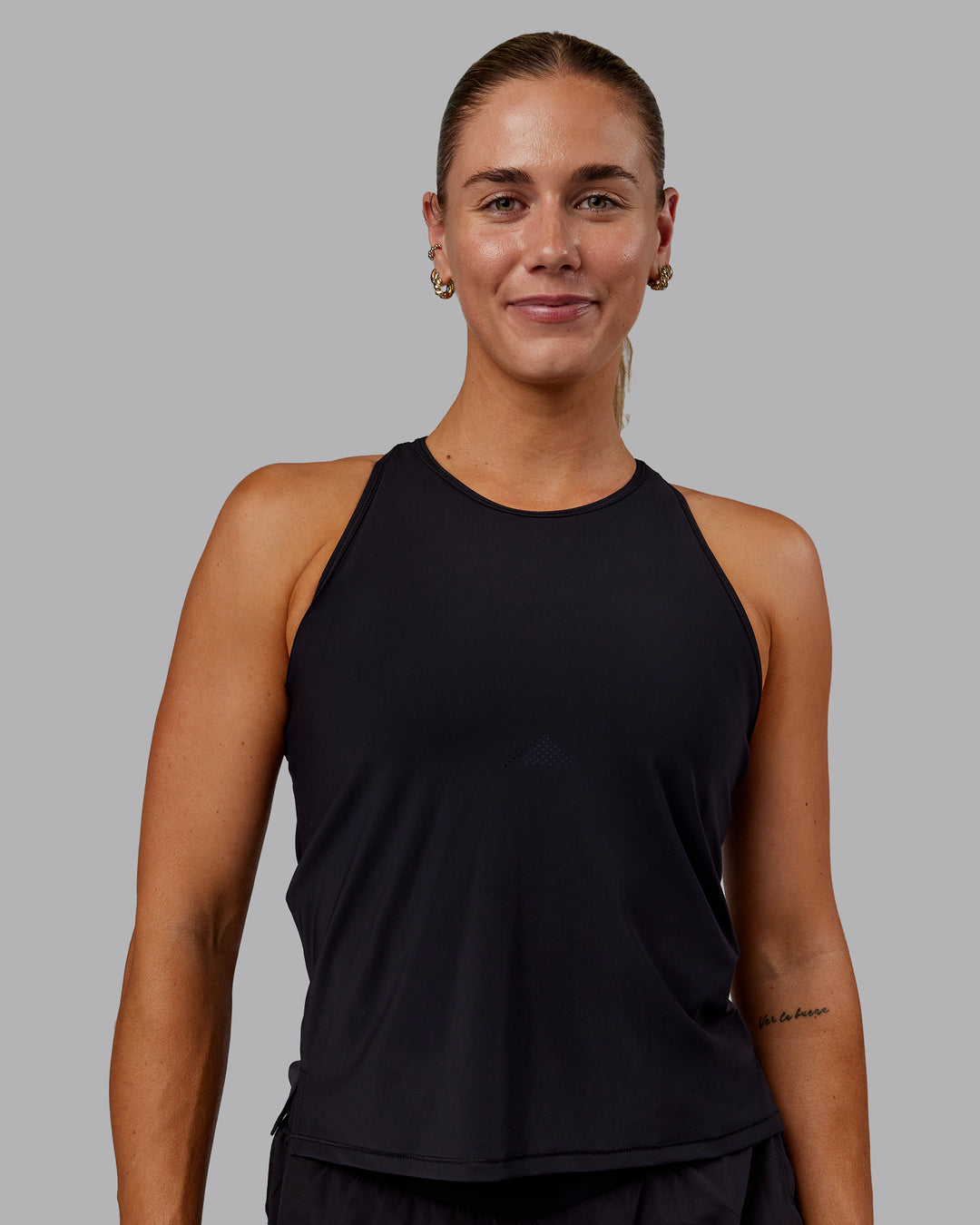 Woman wearing Cadence Tank - Black - view 2