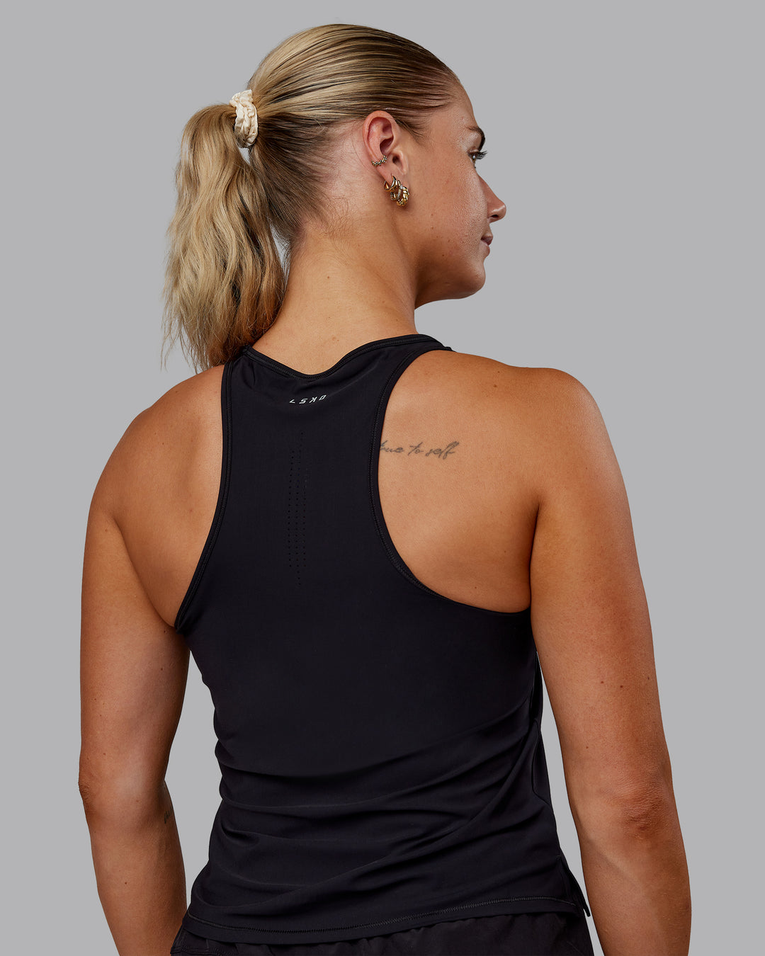 Woman wearing Cadence Tank - Black - view 4