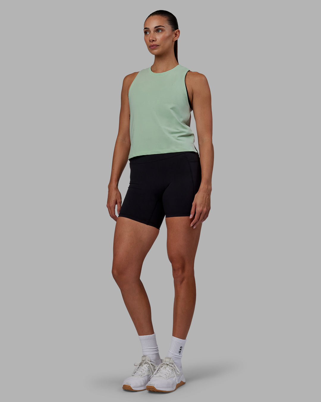 Woman wearing Deluxe PimaFLX Tank - Surf Spray - view 2