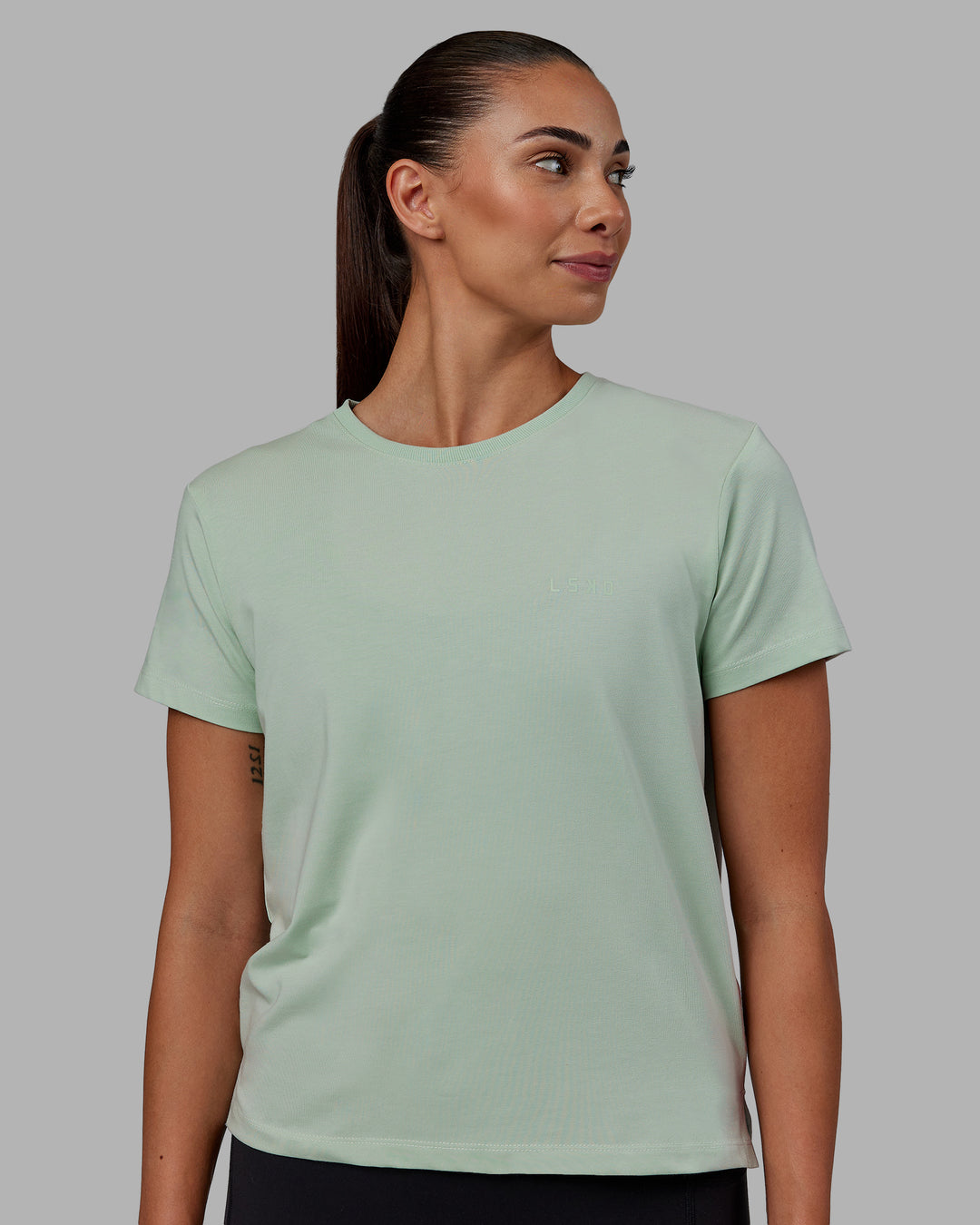 Woman wearing Deluxe PimaFLX Tee - Surf Spray - view 2