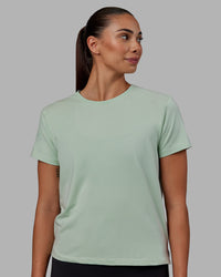 Woman wearing Deluxe PimaFLX Tee - Surf Spray | Thumbnail Index: 1