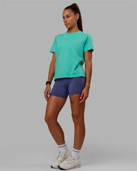 Woman wearing Love The Run FLXCotton Tee - Aquatic Awe-White | Thumbnail Index: 2