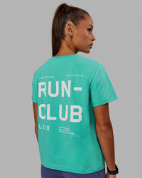 Woman wearing Love The Run FLXCotton Tee - Aquatic Awe-White | Thumbnail Index: 0