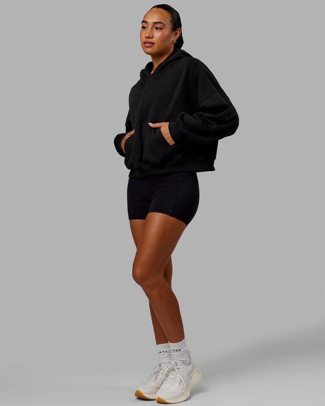 Woman wearing Love The Run Hoodie - Black - view 3