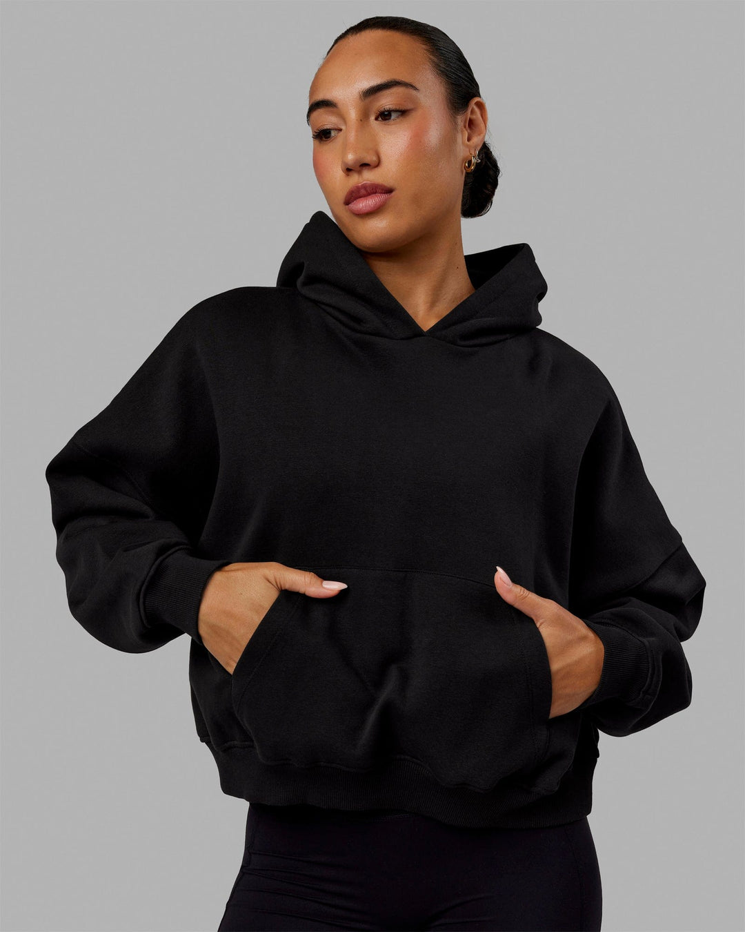 Woman wearing Love The Run Hoodie - Black - view 2