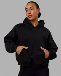 Woman wearing Love The Run Hoodie - Black | Thumbnail Index: 1