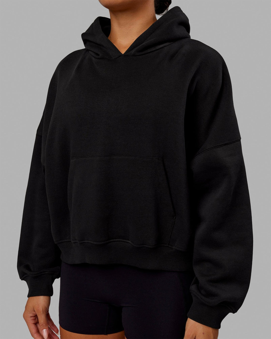 Woman wearing Love The Run Hoodie - Black - view 5