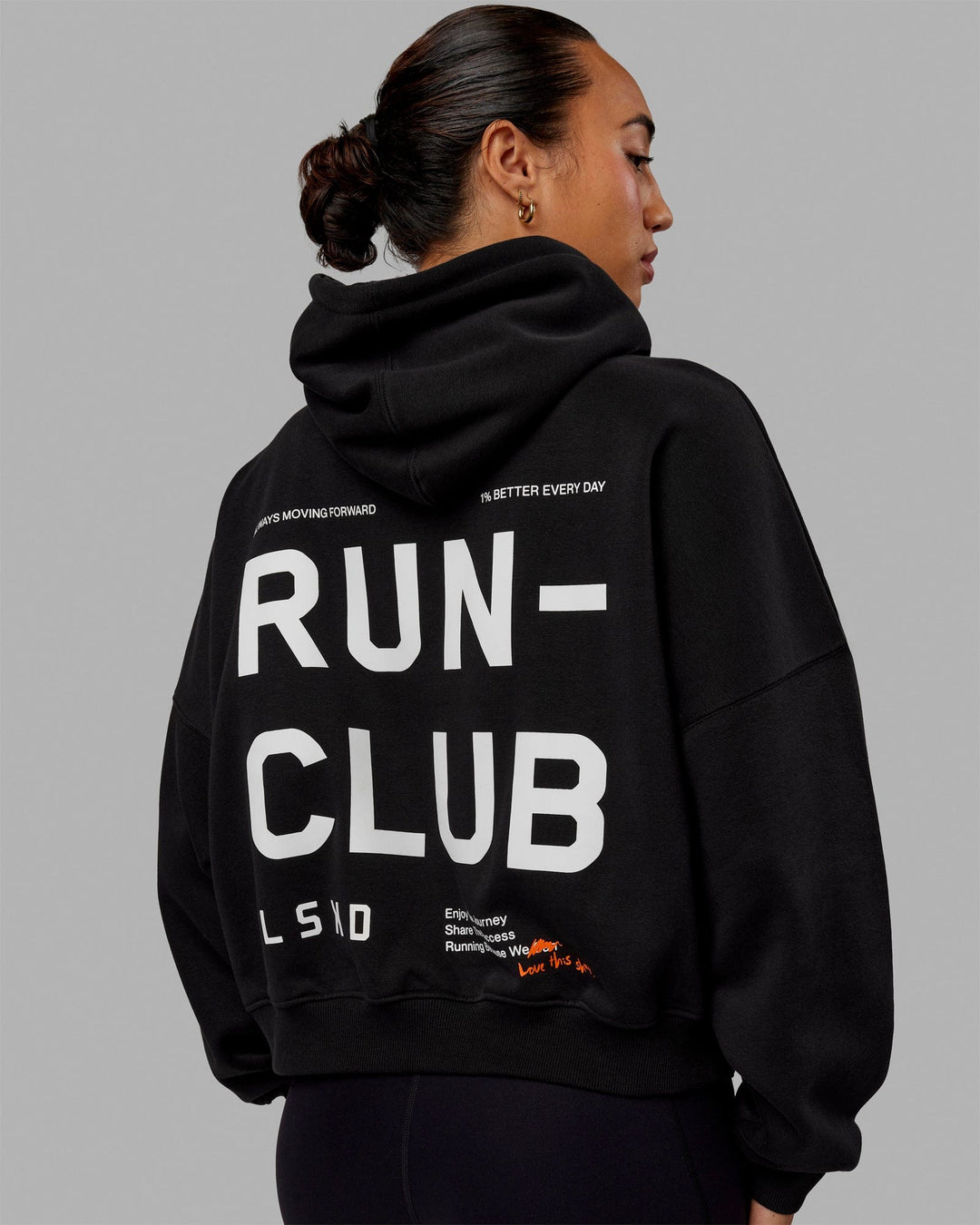 Woman wearing Love The Run Hoodie - Black - view 1