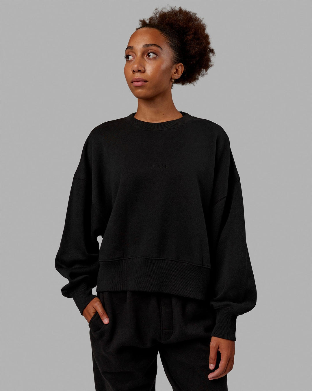 Woman wearing MVP Oversized Sweater - Black-Black - view 1