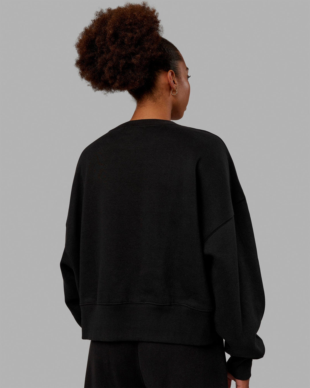 Woman wearing MVP Oversized Sweater - Black-Black - view 5