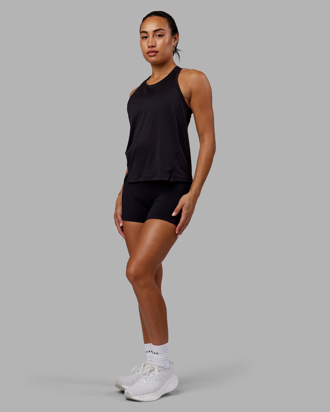 Woman wearing Pace Running Tank - Black - view 4
