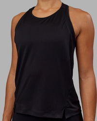 Woman wearing Pace Running Tank - Black | Thumbnail Index: 4