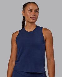 Woman wearing Deluxe PimaFLX Tank - Future Navy | Thumbnail Index: 1