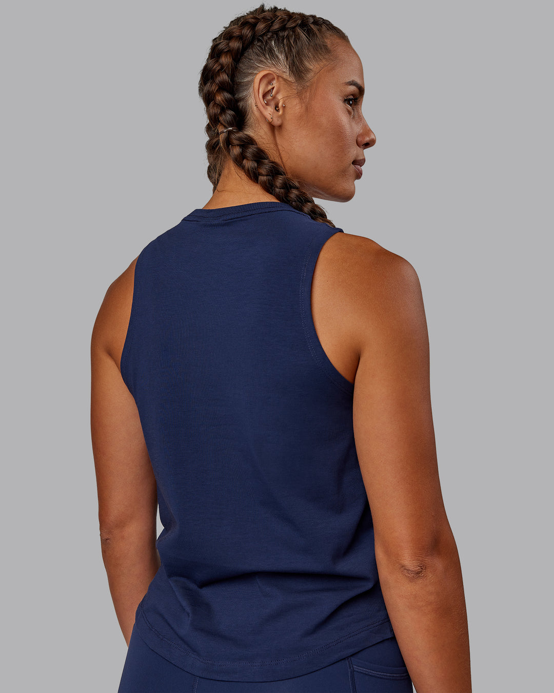 Woman wearing Deluxe PimaFLX Tank - Future Navy - view 3