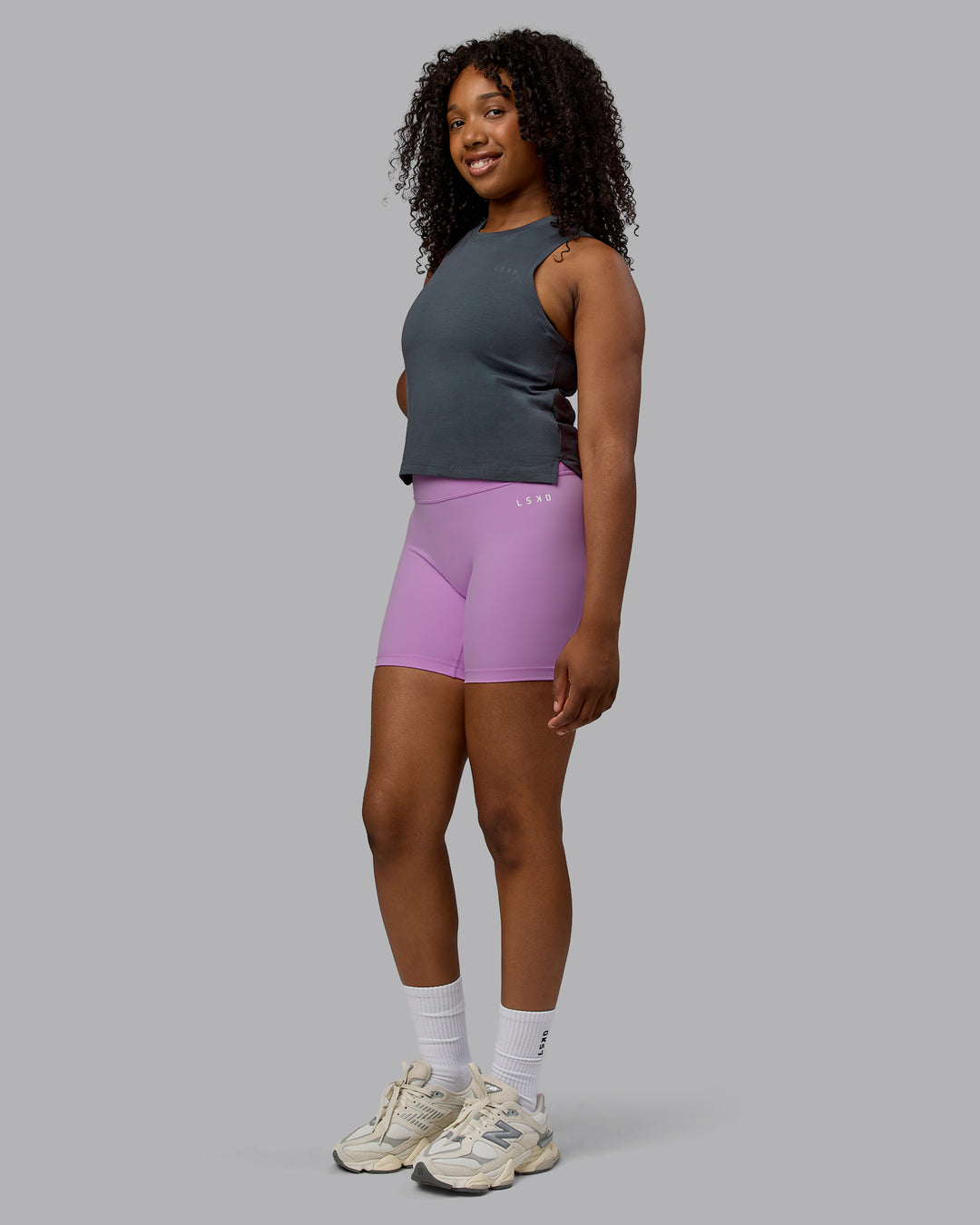 Woman wearing Deluxe PimaFLX Tank - Turbulence - view 2