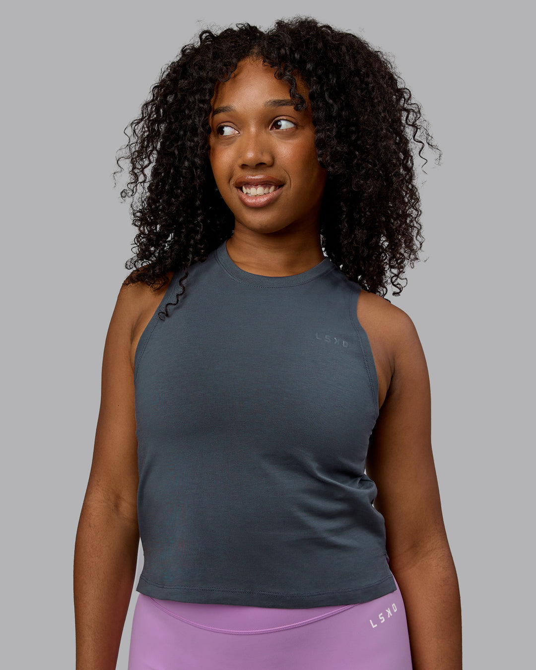 Woman wearing Deluxe PimaFLX Tank - Turbulence - view 3