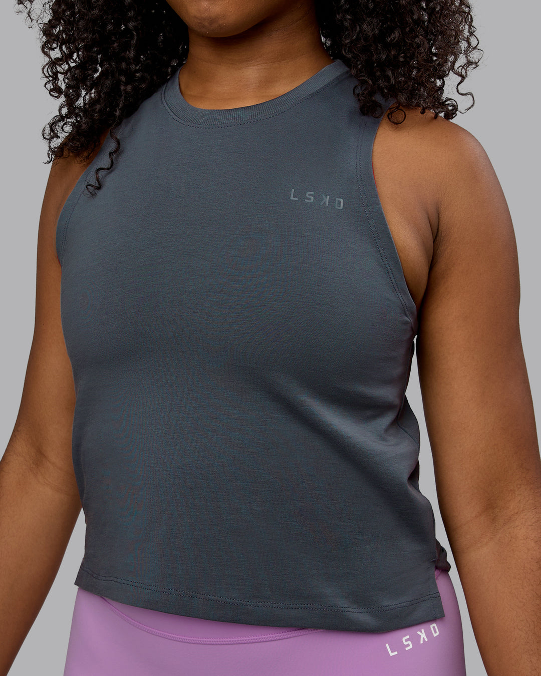 Woman wearing Deluxe PimaFLX Tank - Turbulence - view 1