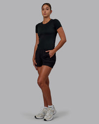 Women Wearing Restore CloudFLX Short - Black | Thumbnail Index: 4