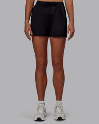 Women Wearing Restore CloudFLX Short - Black | Thumbnail Index: 5