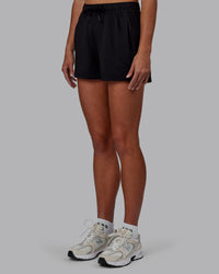 Women Wearing Restore CloudFLX Short - Black | Thumbnail Index: 0