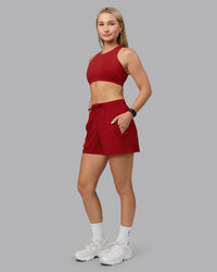 Woman wearing Restore CloudFLX Shorts - Cherry Red | Thumbnail Index: 4