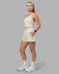 Woman wearing Restore CloudFLX Shorts - Ivory | Thumbnail Index: 0