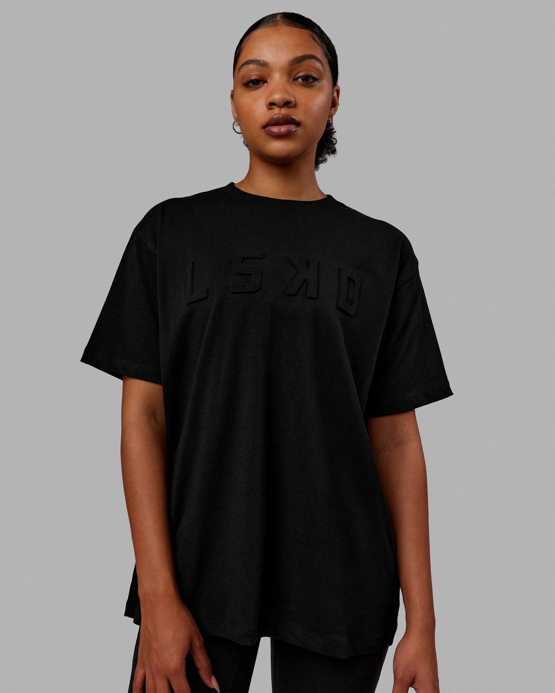 Woman wearing Stamped Heavyweight Oversized Tee - Black - view 1