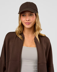 Woman wearing CF Move Through Cap - Hot Chocolate | Model:Leilani | Size:OS | Thumbnail Index: 4