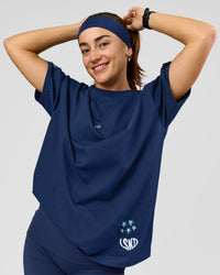 Woman wearing Pace Bonded Headband - Future Navy | Model:Grace  | Thumbnail Index: 2