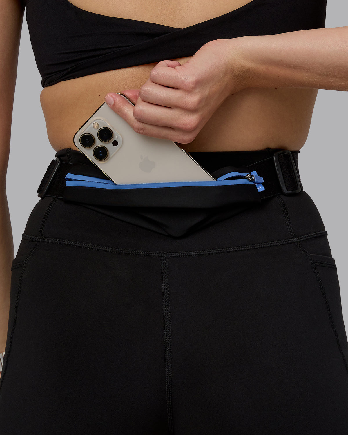 Woman wearing Rep Running Belt 2.0 - Black-Ultramarine - view 1