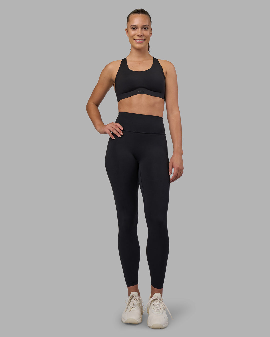 Woman wearing Stability Sports Bra - Black | Model:Charlize | Size:S (A-C Cup) - view 6