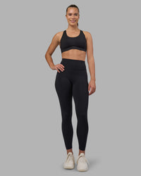 Woman wearing Stability Sports Bra - Black | Model:Charlize | Size:S (A-C Cup) | Thumbnail Index: 5