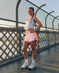 Woman wearing Accelerate 3" High-Rise Running Short - Cantaloupe-Marshmallow | Model:Jasynta | Size:S | Thumbnail Index: 2