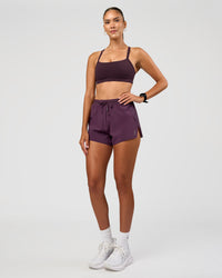 Woman wearing Accelerate 3" High-Rise Running Short - Midnight Plum | Model:Rhiley | Size:S | Thumbnail Index: 4