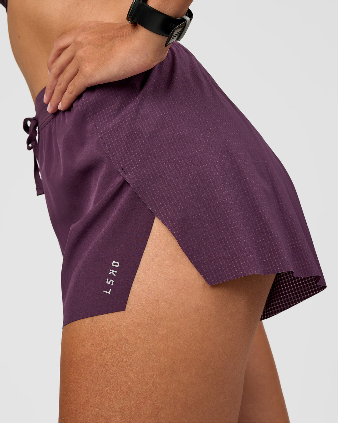 Woman wearing Accelerate 3" High-Rise Running Short - Midnight Plum | Model:Rhiley | Size:S - view 6