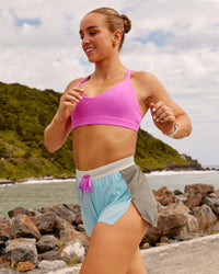 Woman wearing Accelerate 3" High-Rise Running Short - Taupe Ash-Glacial Blue | Model:Ella | Size:S | Thumbnail Index: 5