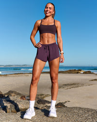Woman wearing Accelerate 3" Mid-Rise Running Short - Midnight Plum | Model:Roisin | Size:S | Thumbnail Index: 6