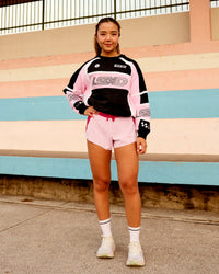 Woman wearing Accelerate 3" Mid-Rise Running Short - Scarlet-Marshmallow | Model:Clare | Size:S | Thumbnail Index: 5