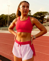 Woman wearing Accelerate 3" Mid-Rise Running Short - Scarlet-Marshmallow | Model:Clare | Size:S | Thumbnail Index: 3