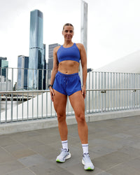 Woman wearing Accelerate Sports Bra in Power Cobalt | Size:S | Thumbnail Index: 2