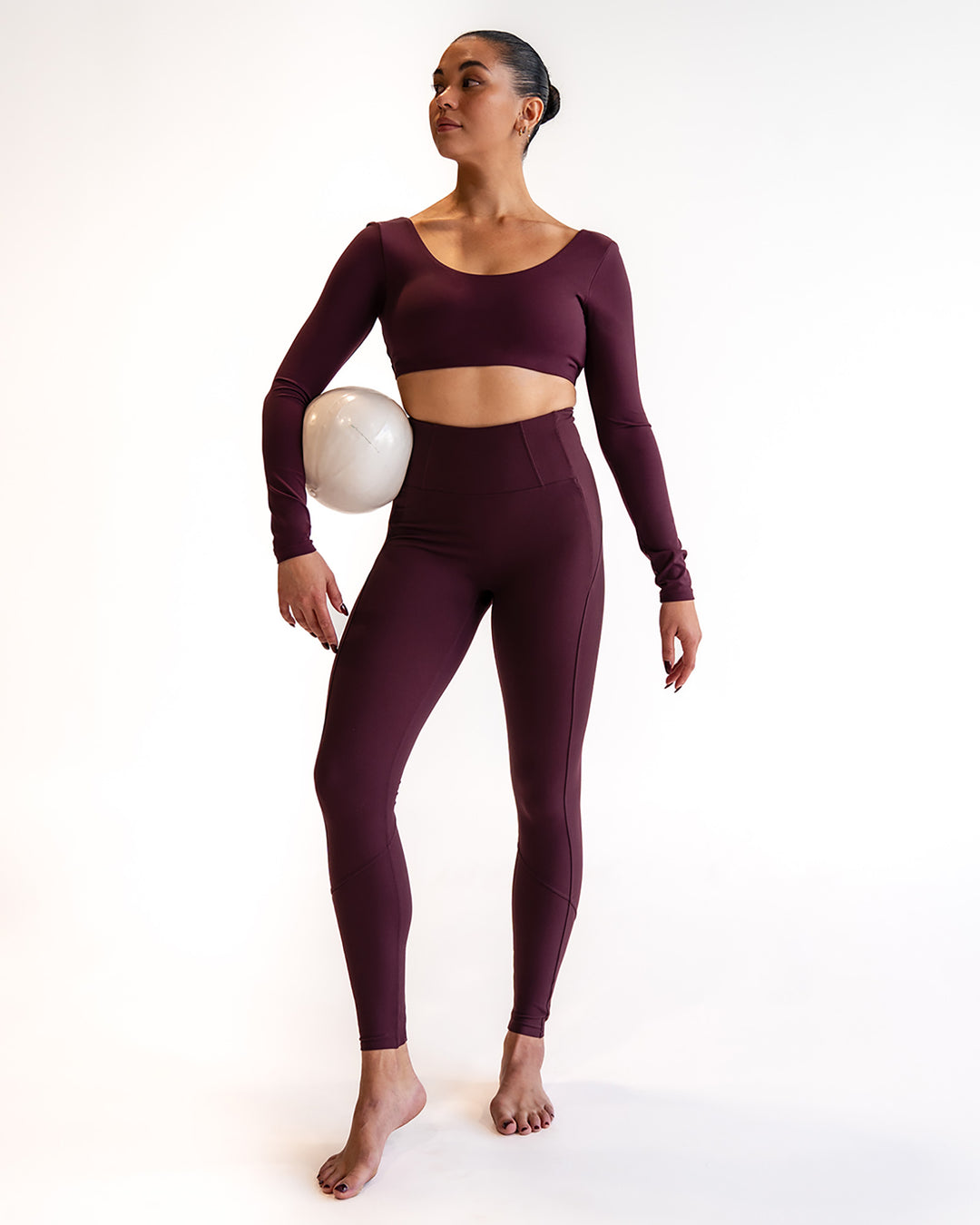 Woman wearing Aria Long Sleeve Sports Bra - Cherry Lacquer | Model:Sarah | Size:S - view 3